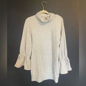 grey turtleneck sweater dress with flaired sleeves